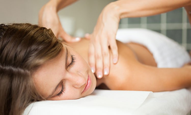 A woman receiving a massage